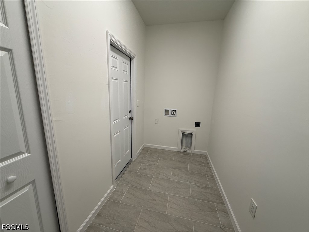 2809 Darlene Place Lehigh Acres, FL 33971 - Photo 19 of 26 a view of hallway with closet