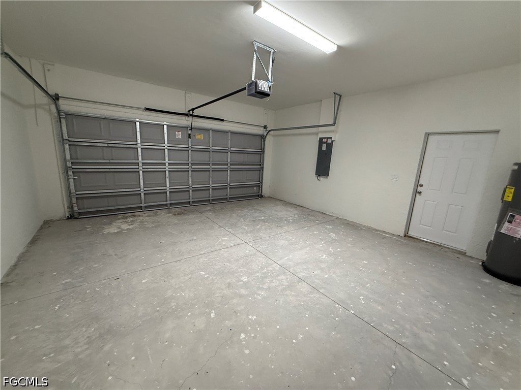 2809 Darlene Place Lehigh Acres, FL 33971 - Photo 20 of 26 a view of a garage room