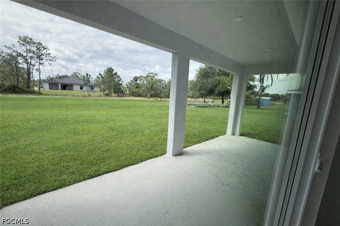 2809 Darlene Place Lehigh Acres, FL 33971 - Photo 21 of 26 a view of outdoor space and yard