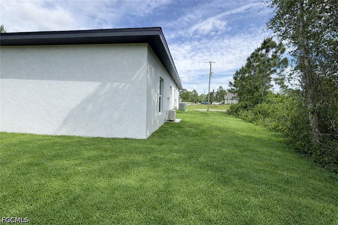 2809 Darlene Place Lehigh Acres, FL 33971 - Photo 26 of 26 a view of a backyard