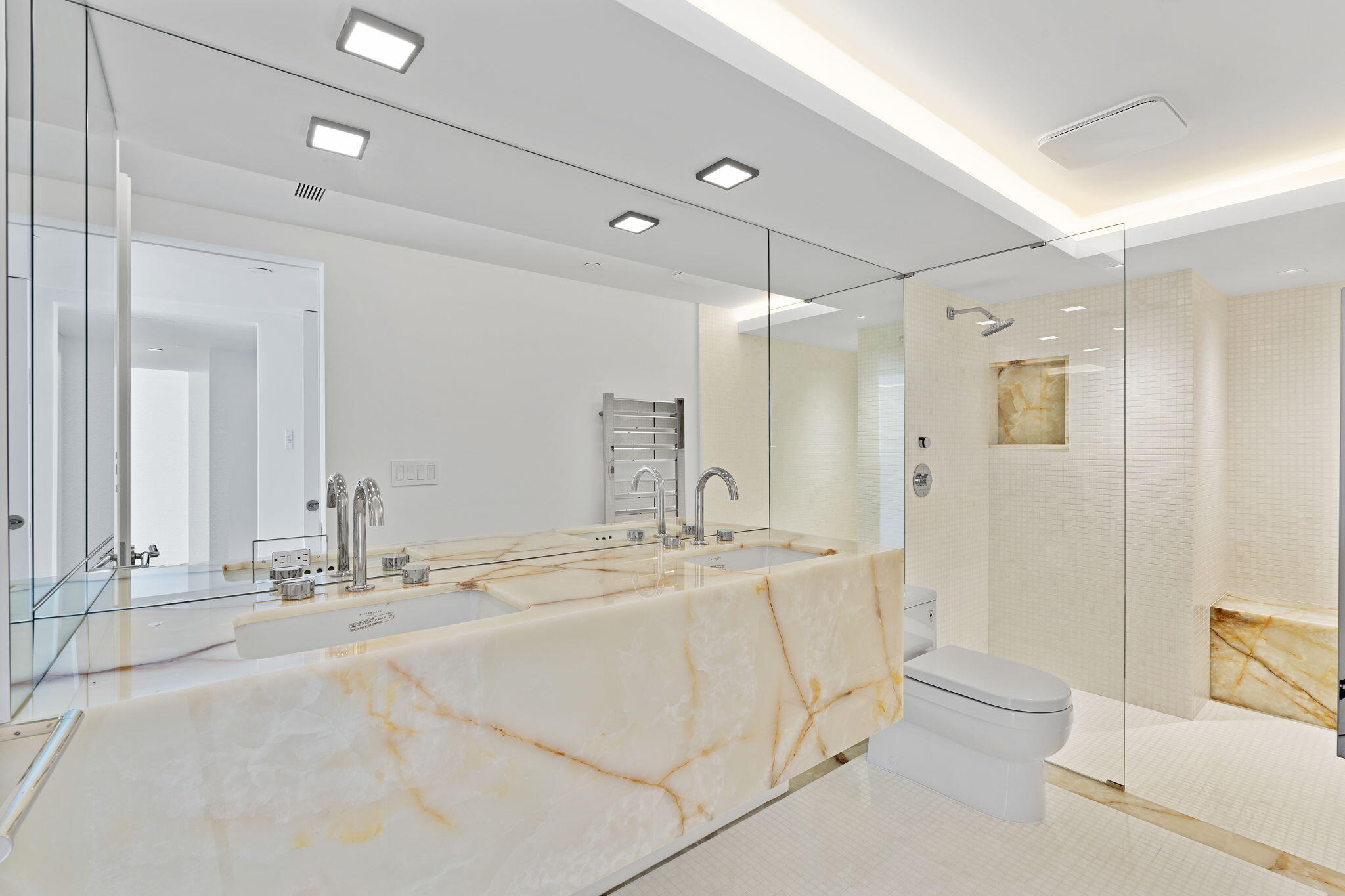 529 South Flagler Drive, Unit TH3E West Palm Beach, FL 33401 - Photo 16 of 38 a bathroom with a sink a toilet and shower