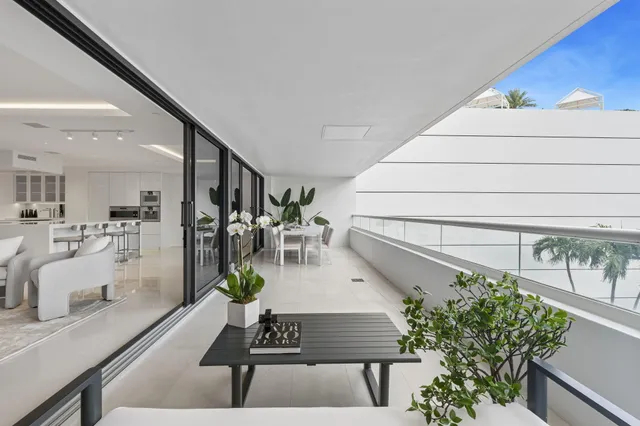 a view of balcony with furniture