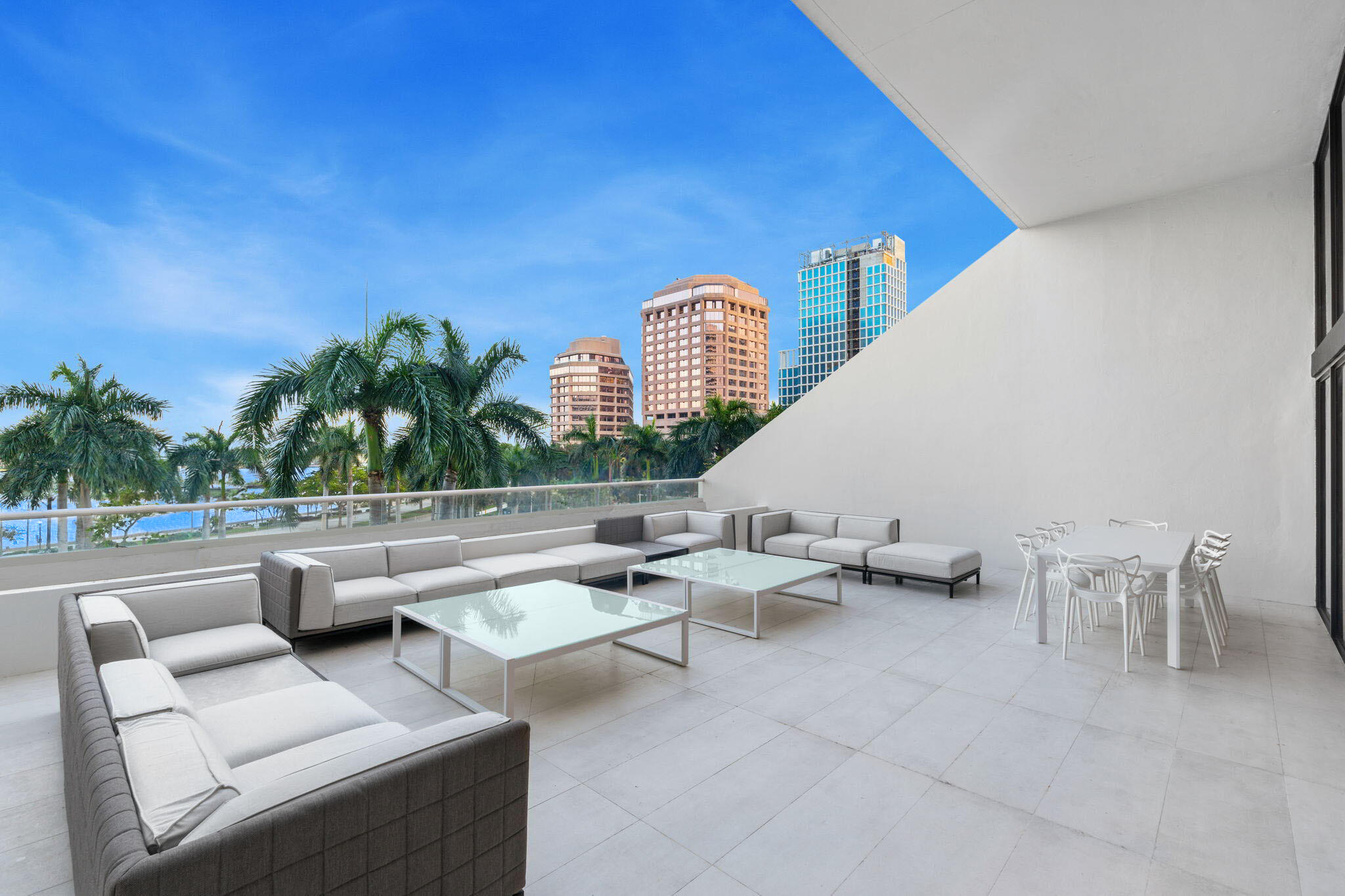 529 South Flagler Drive, Unit TH3E West Palm Beach, FL 33401 - Photo 26 of 38 a living room with furniture and a potted plant