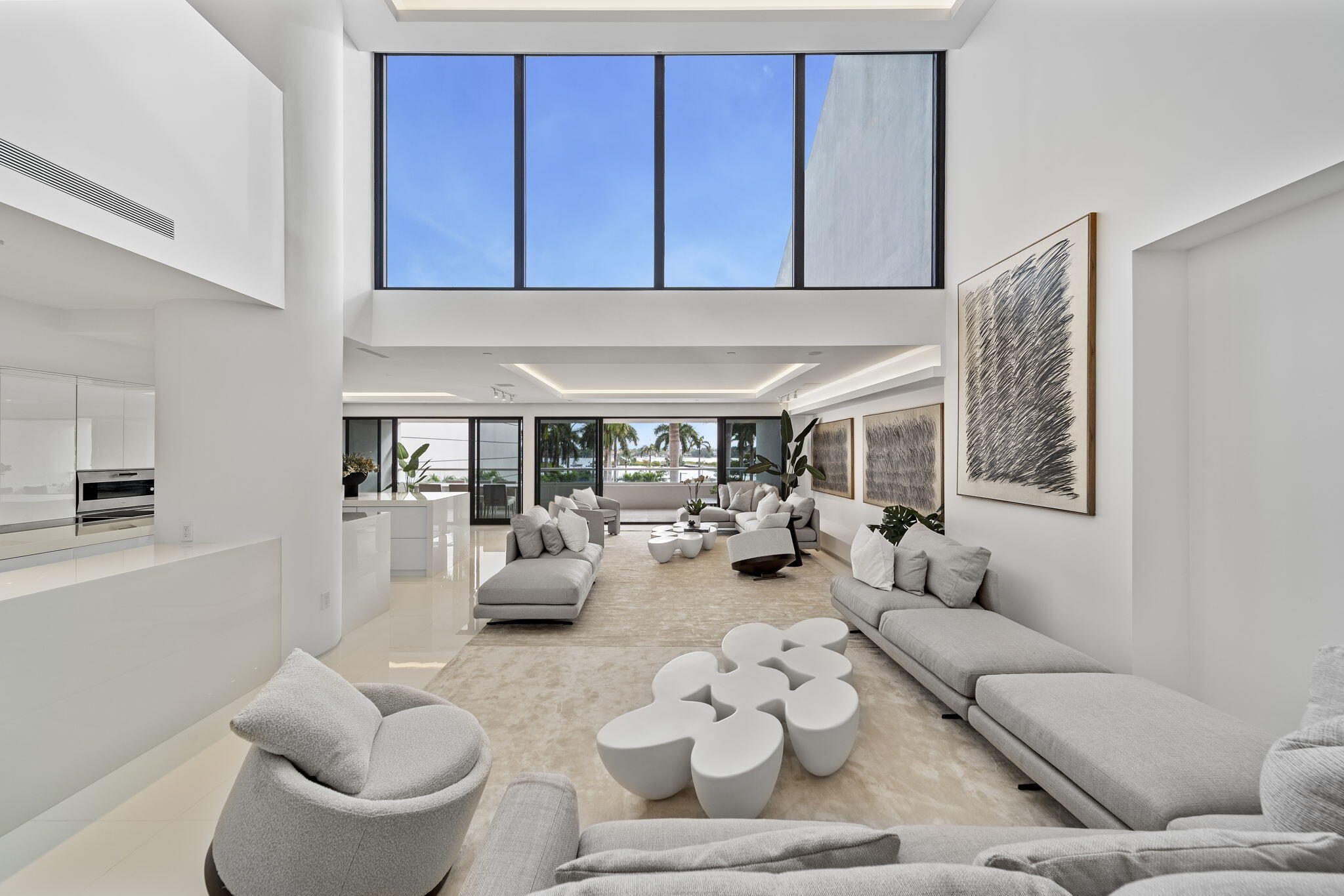 529 South Flagler Drive, Unit TH3E West Palm Beach, FL 33401 - Photo 5 of 38 a living room with furniture and a large window