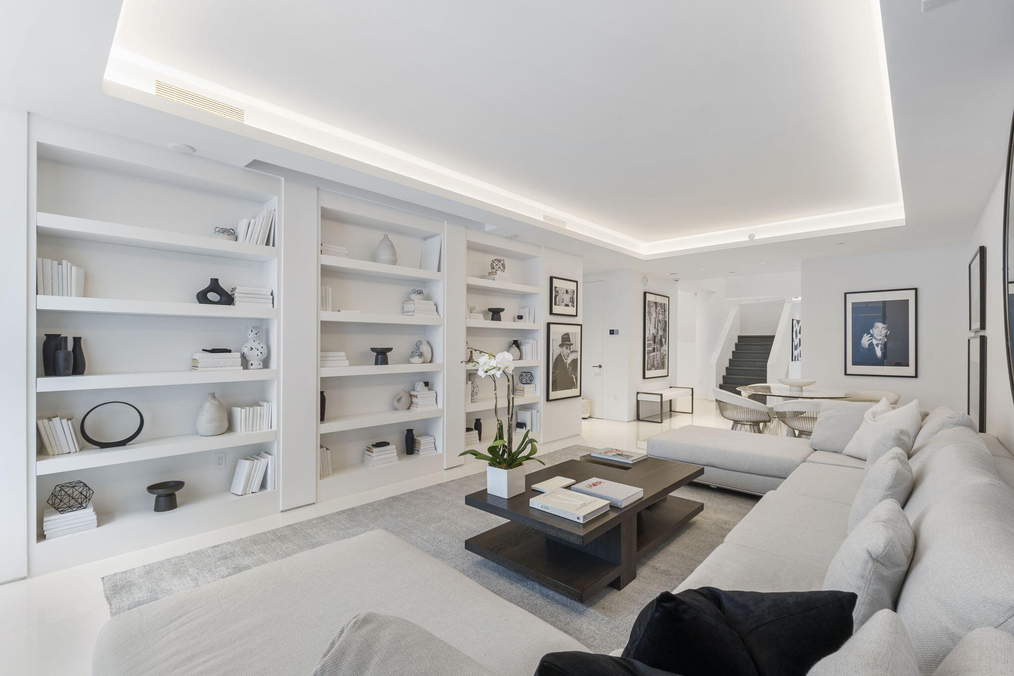 529 South Flagler Drive, Unit TH3E West Palm Beach, FL 33401 - Photo 7 of 38 a living room with furniture and wooden floor