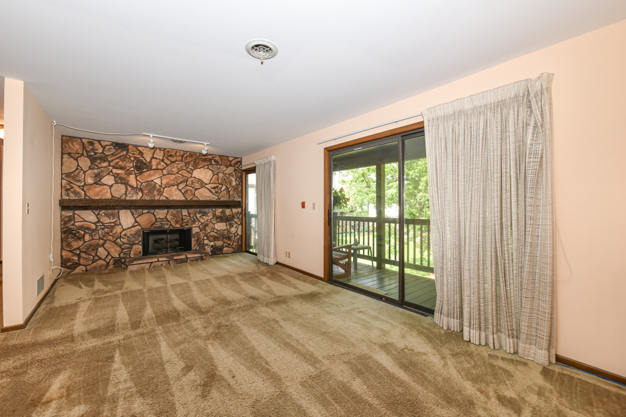 23 Willabay Drive, Unit D Williams Bay, WI 53191 - Photo 16 of 42 Wall to wall gas fireplace