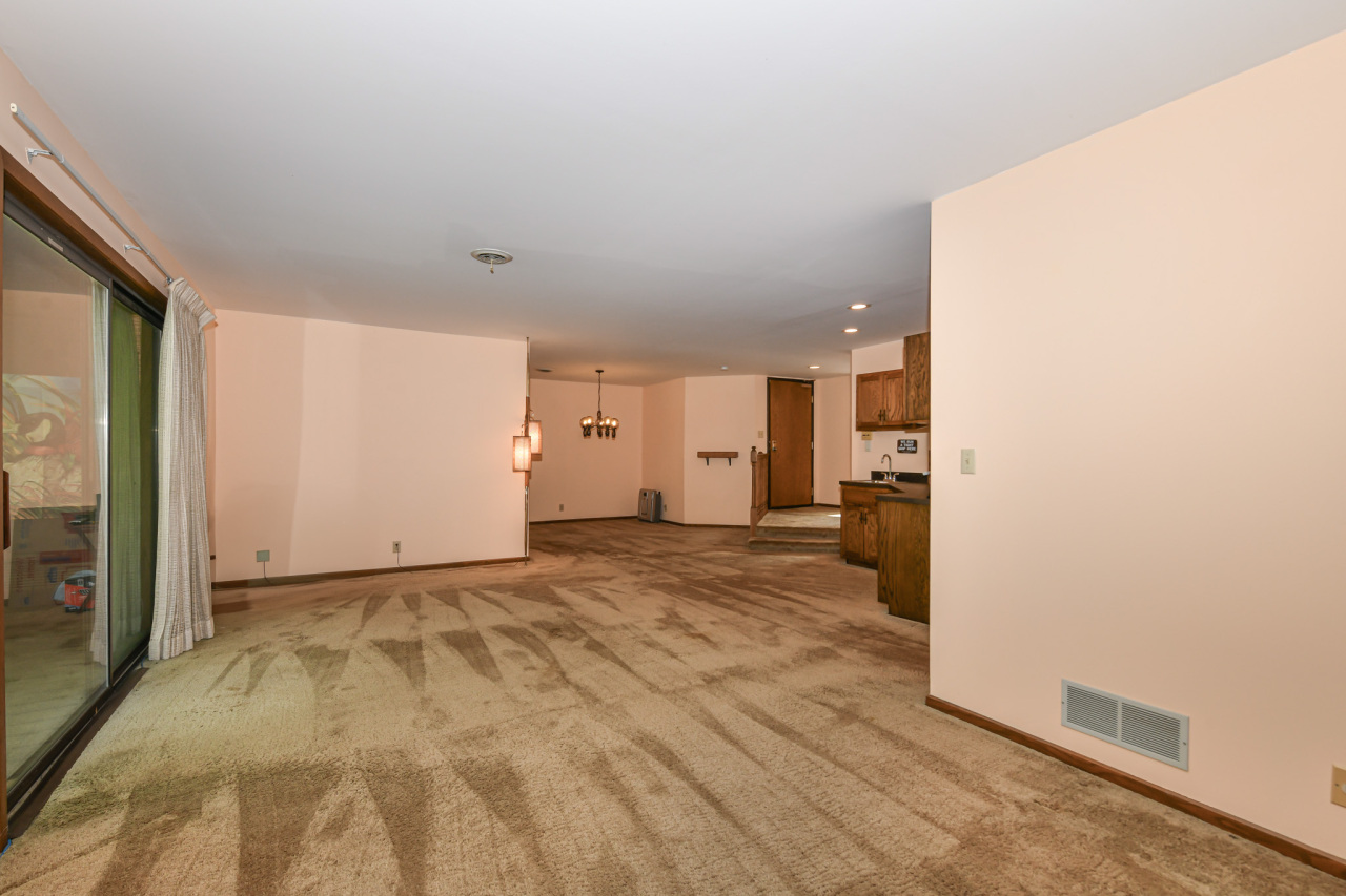 23 Willabay Drive, Unit D Williams Bay, WI 53191 - Photo 19 of 42 Living into dining area