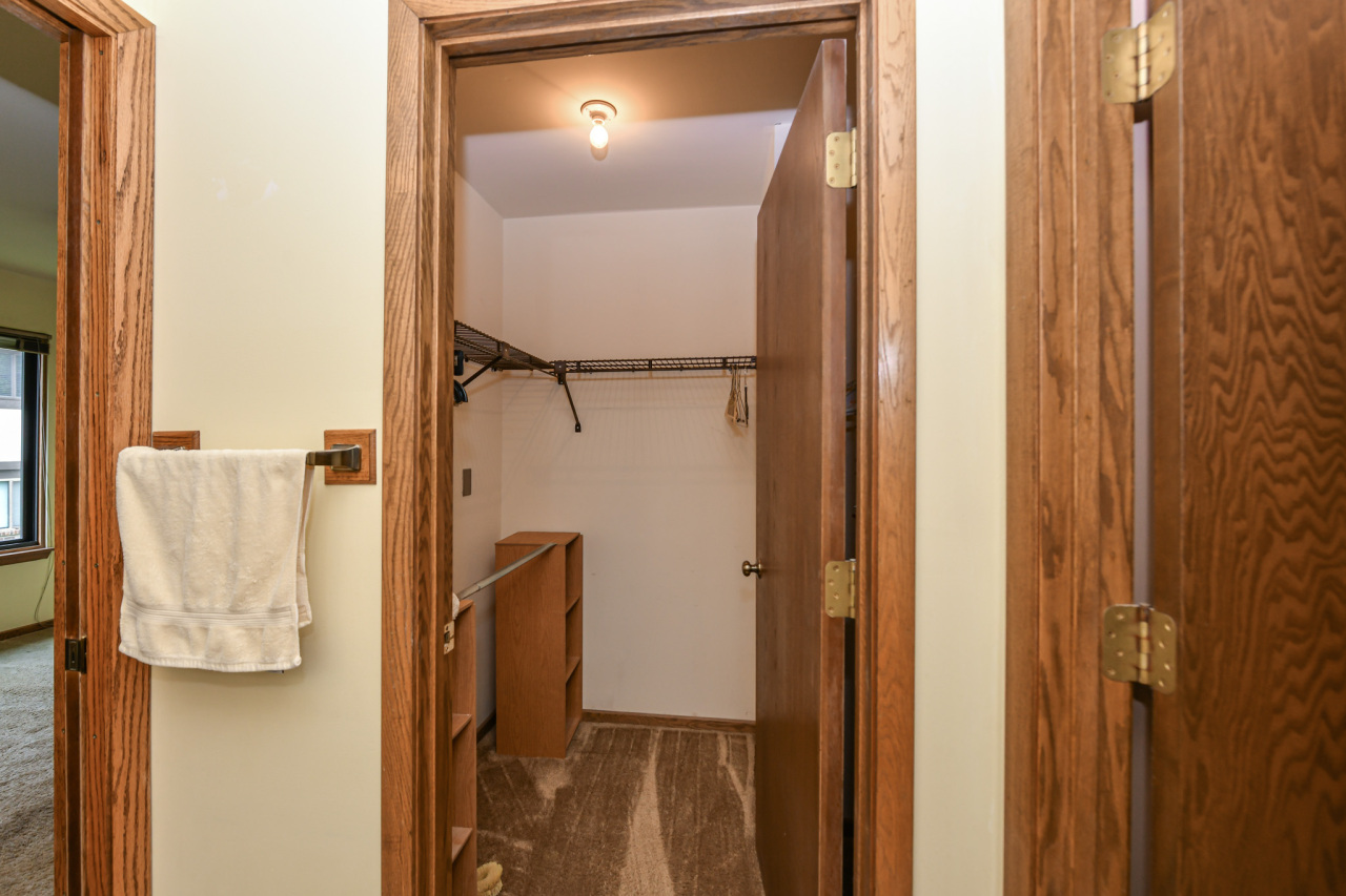 23 Willabay Drive, Unit D Williams Bay, WI 53191 - Photo 30 of 42 Walk in closet in primary