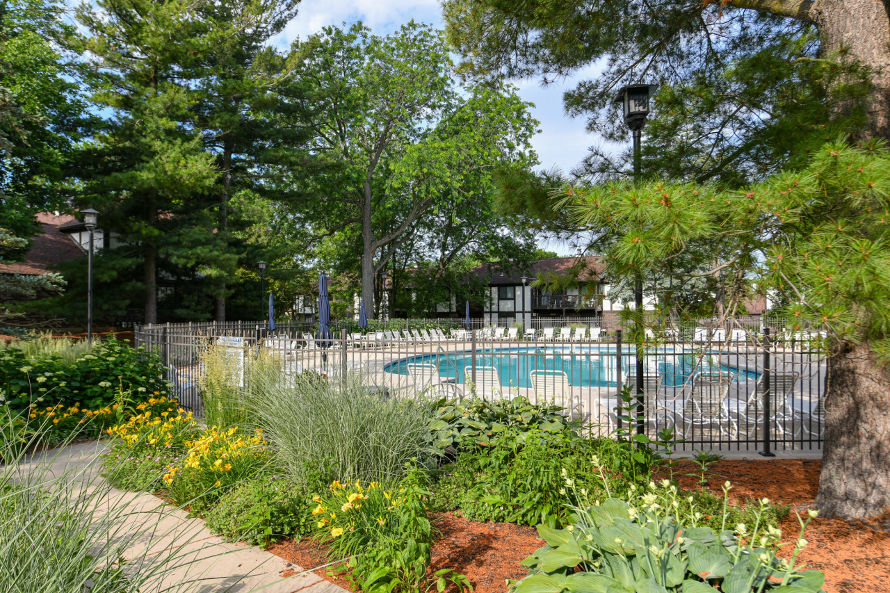 23 Willabay Drive, Unit D Williams Bay, WI 53191 - Photo 3 of 42 Serene setting around pool
