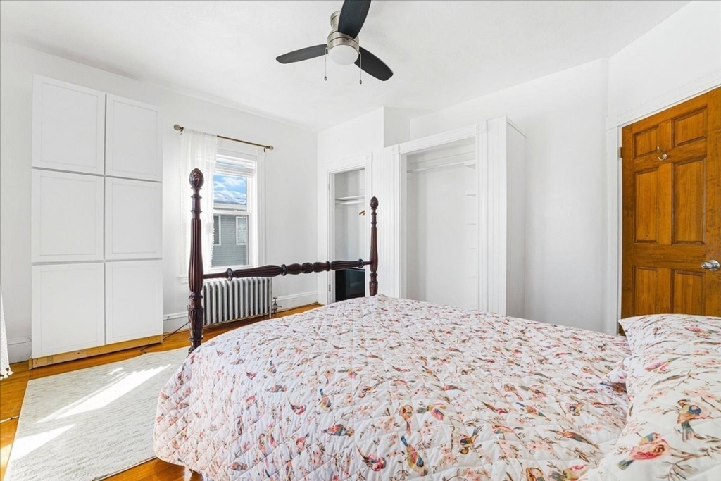 73 Hudson Street Milton, MA 02186 - Photo 23 of 42 a bedroom with a bed and a dresser