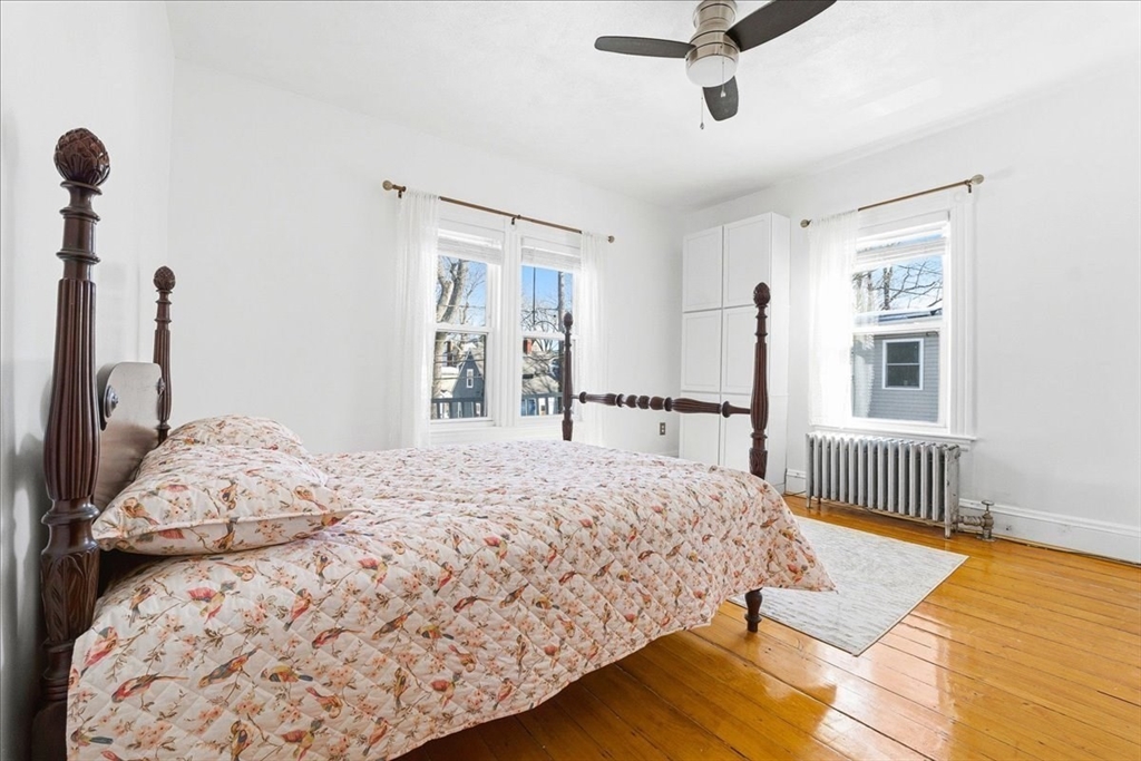 73 Hudson Street Milton, MA 02186 - Photo 24 of 42 a bedroom with a bed and a window
