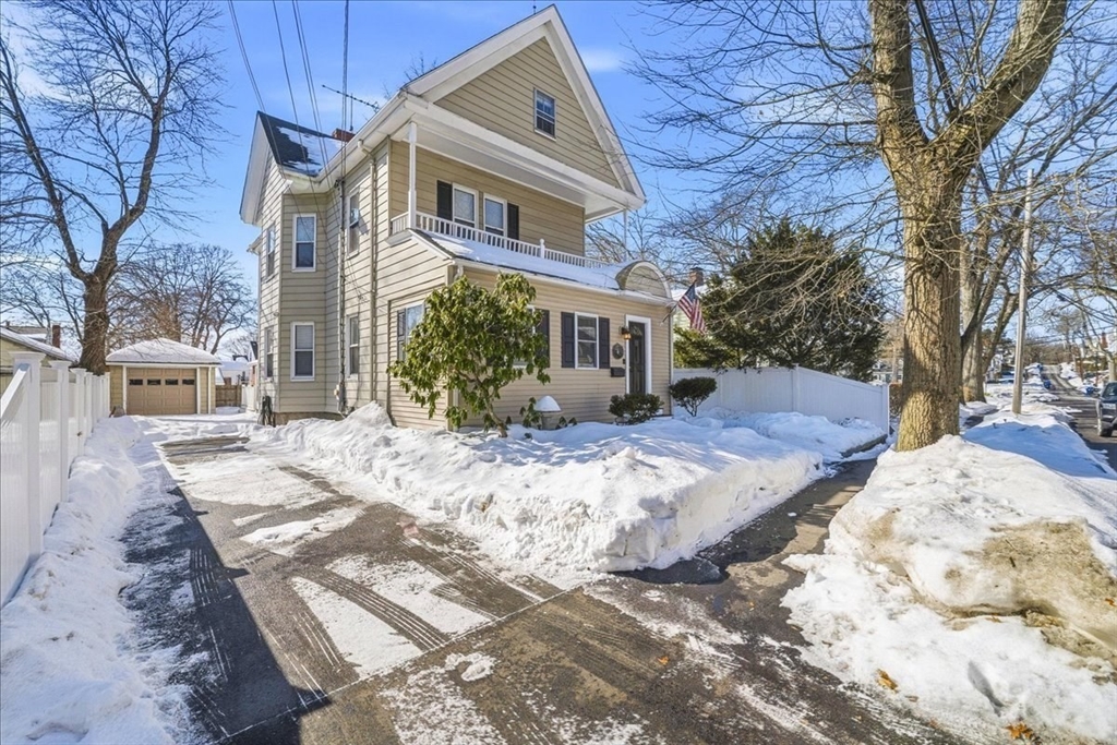 73 Hudson Street Milton, MA 02186 - Photo 3 of 42 a view of a yard with a house
