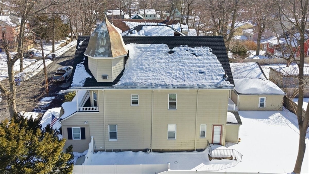 73 Hudson Street Milton, MA 02186 - Photo 34 of 42 front view of a house with two chairs