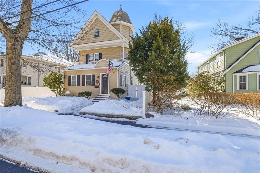 73 Hudson Street Milton, MA 02186 - Photo 4 of 42 a front view of a house with a yard