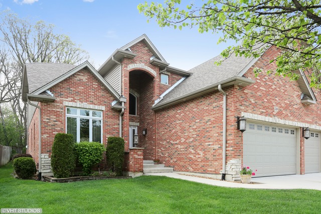 a front view of house with yard