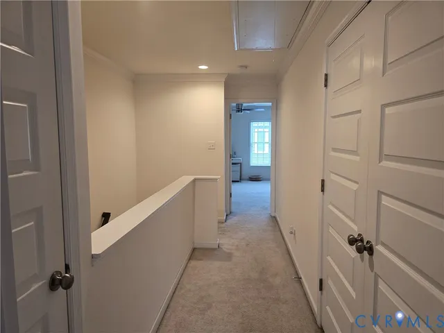 a view of hallway with stairs