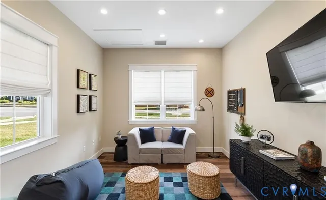 a view of a patio with a table and chairs