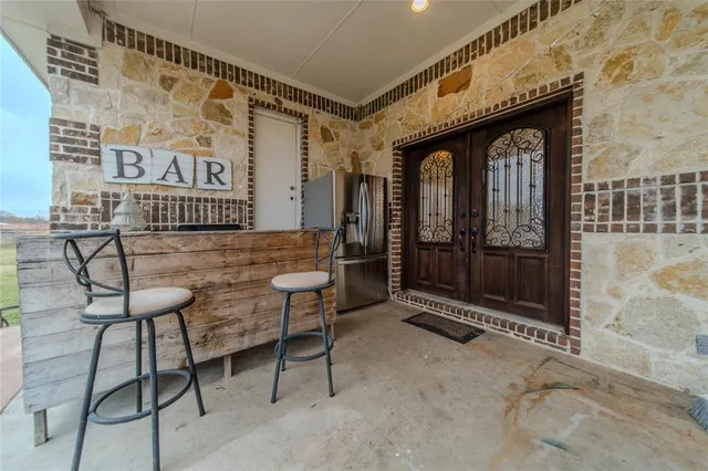 a view of entryway with a front door