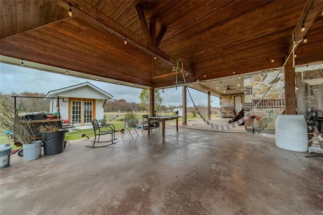 a view of a large body of water with lots of palm trees