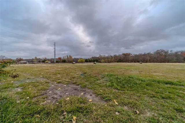 a view of a car parked in front of a house