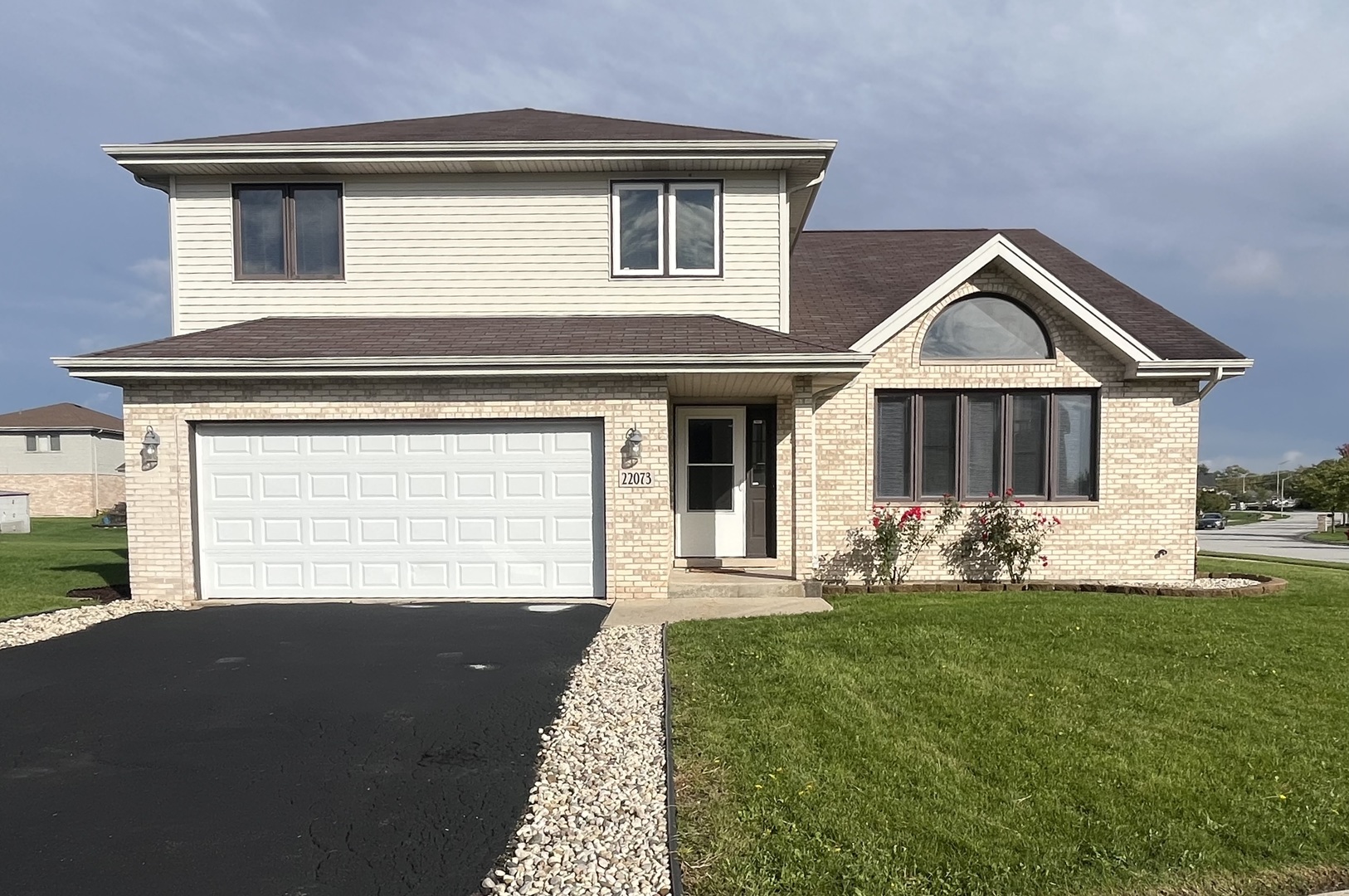 22073 Spring Lane Richton Park, IL 60471 - Photo 1 of 30 a front view of a house with a yard and porch