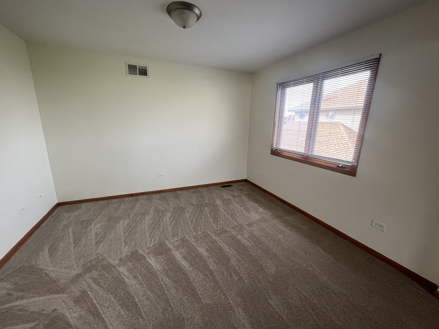 22073 Spring Lane Richton Park, IL 60471 - Photo 17 of 30 an empty room with a window