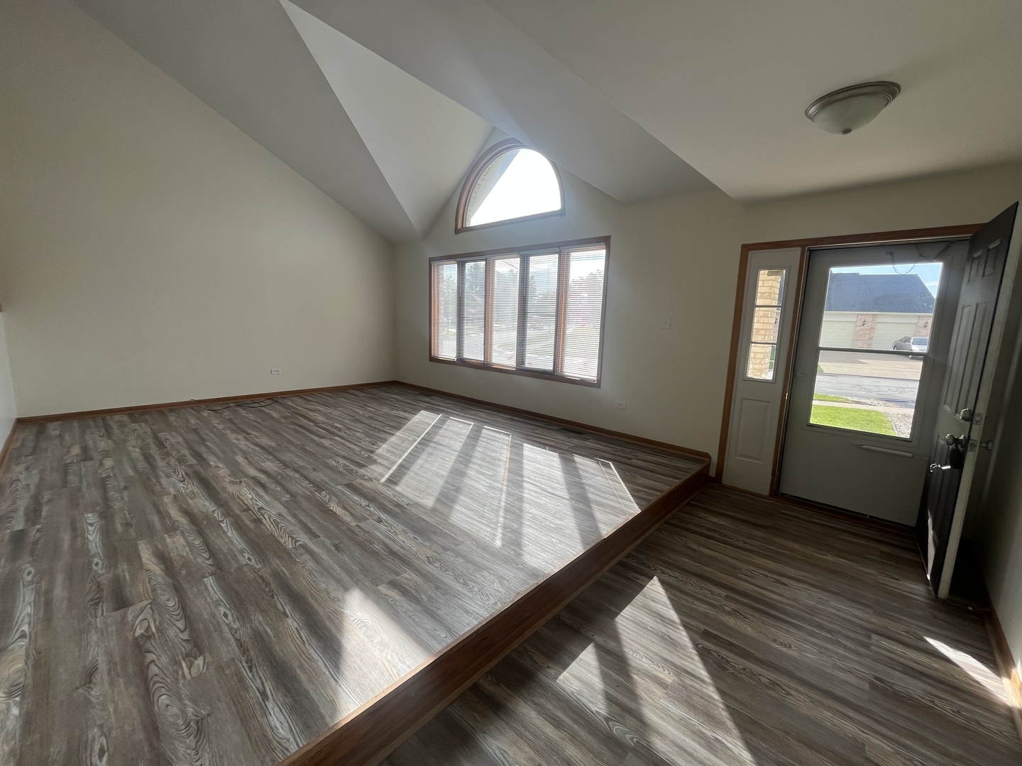 22073 Spring Lane Richton Park, IL 60471 - Photo 2 of 30 wooden floor in an empty room with a window