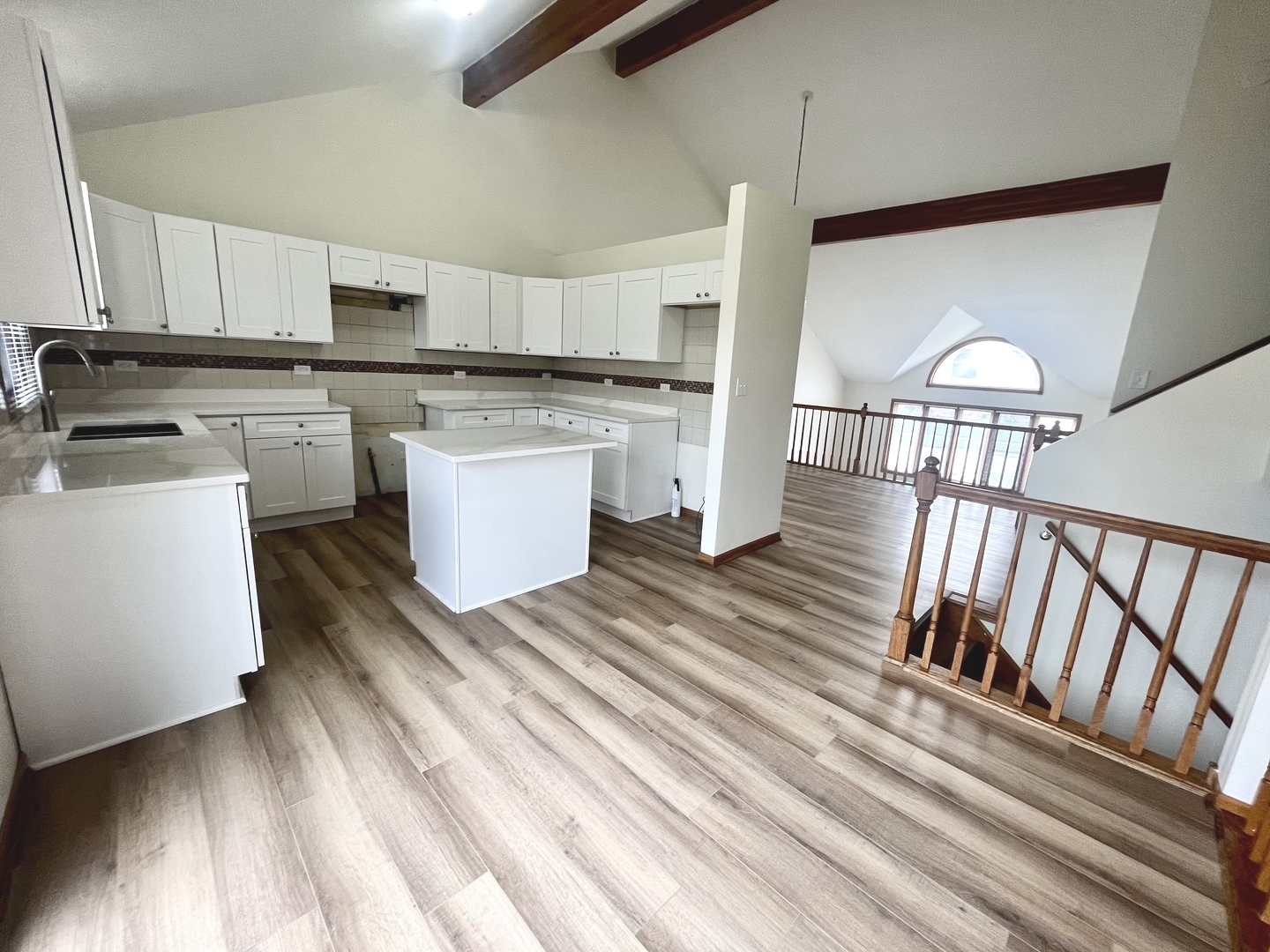 22073 Spring Lane Richton Park, IL 60471 - Photo 6 of 30 a kitchen with white cabinets and white appliances