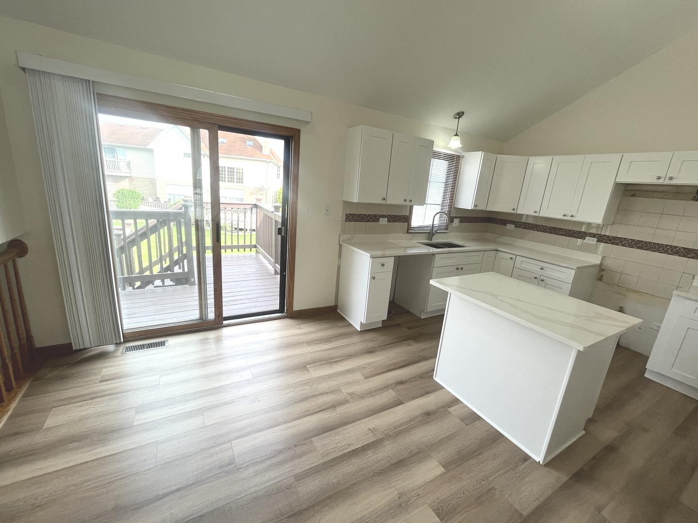 22073 Spring Lane Richton Park, IL 60471 - Photo 7 of 30 a kitchen with a sink stove and wooden floor
