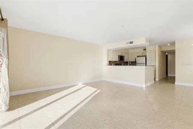 a view of a kitchen with a sink