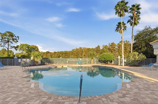 a view of a house with swimming pool