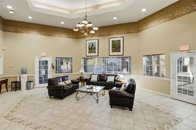 a front view of a building with a garden