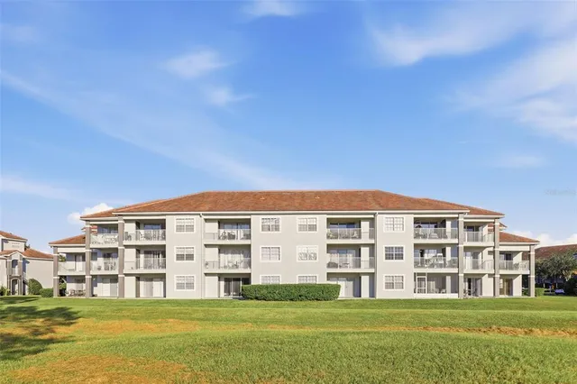 a large building with a big yard