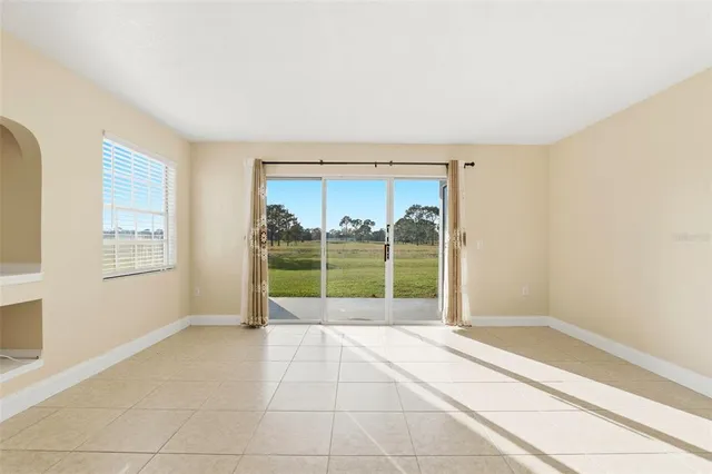 en empty room with windows