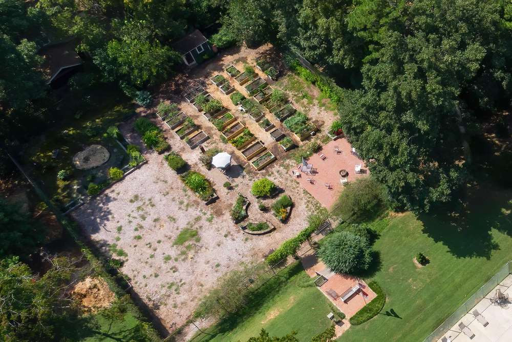 5903 Sentinel Drive Raleigh, NC 27609 - Photo 24 of 26 Beautiful overhead view of the community garden. Community Garden