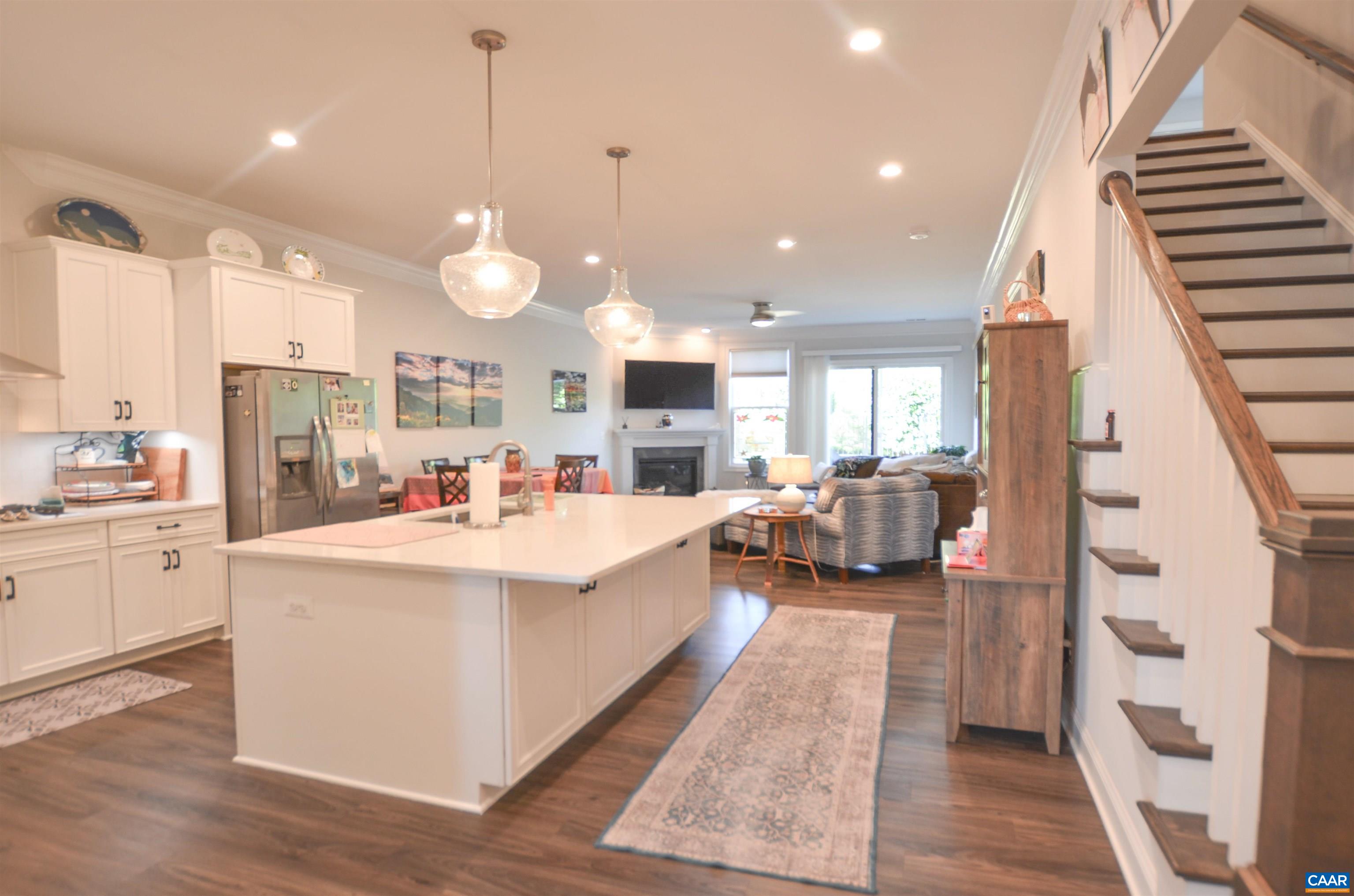 327 Claibourne Road Crozet, VA 22932 - Photo 1 of 36 a large white kitchen with lots of counter space a sink and a large window