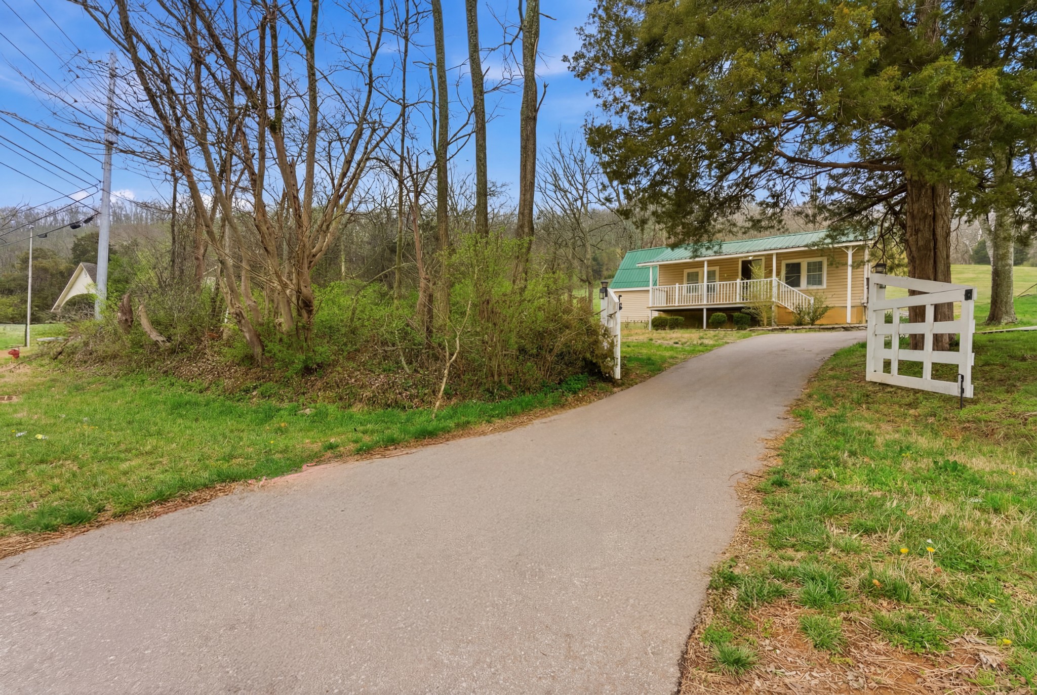 1447 Franklin Road Brentwood, TN 37027 - Photo 27 of 27 a view of a house with a yard and tree s