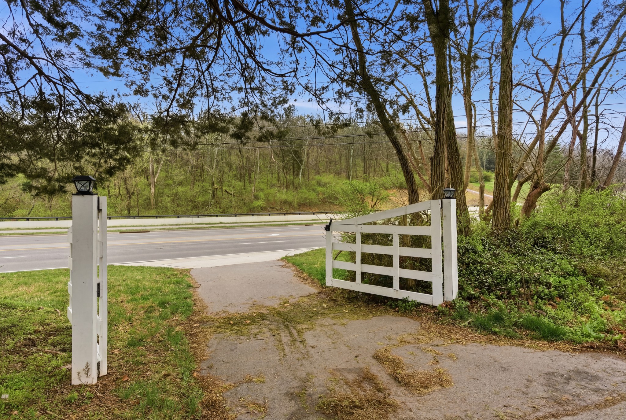 1447 Franklin Road Brentwood, TN 37027 - Photo 6 of 27 a front view of a house with a yard