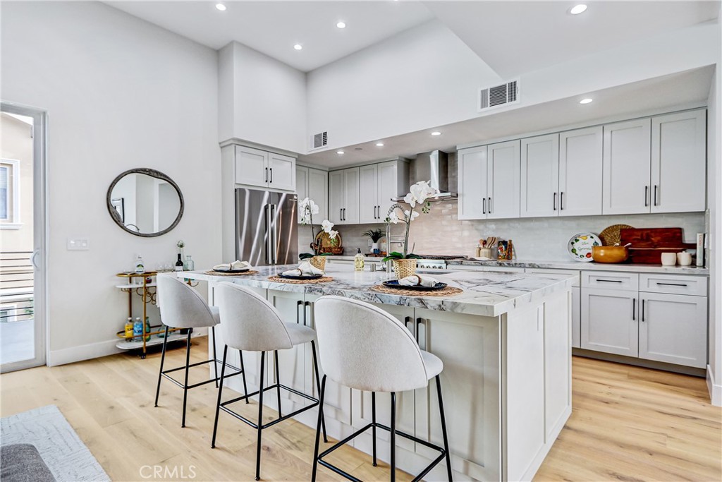 2405 Mathews Avenue, Unit B Redondo Beach, CA 90278 - Photo 11 of 46 a kitchen with a sink cabinets and stainless steel appliances