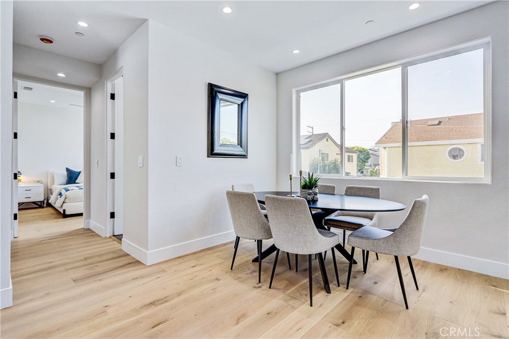 2405 Mathews Avenue, Unit B Redondo Beach, CA 90278 - Photo 17 of 46 a view of a dining room with furniture window and wooden floor