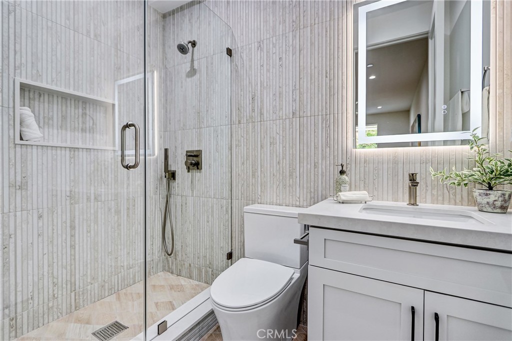 2405 Mathews Avenue, Unit B Redondo Beach, CA 90278 - Photo 32 of 46 a bathroom with a sink toilet and shower