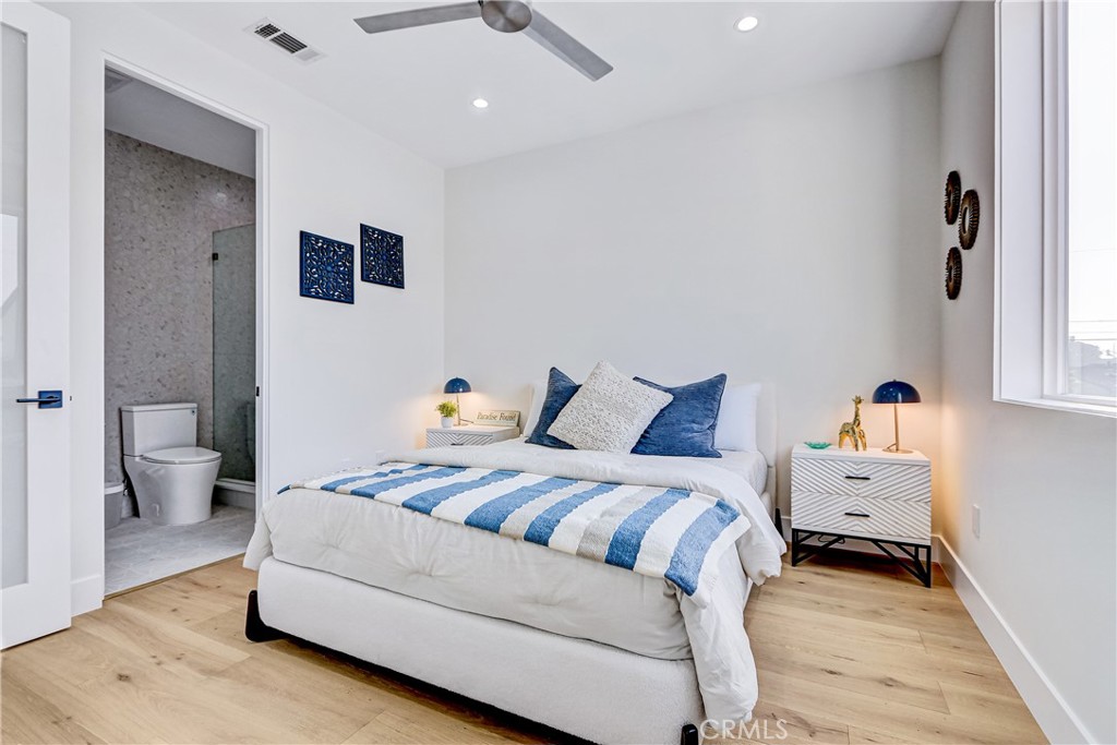 2405 Mathews Avenue, Unit B Redondo Beach, CA 90278 - Photo 37 of 46 a bedroom with a bed and a couch