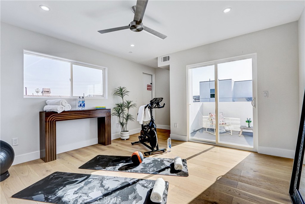 2405 Mathews Avenue, Unit B Redondo Beach, CA 90278 - Photo 43 of 46 a room with gym equipment and a table