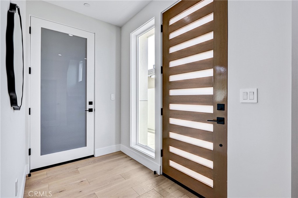 2405 Mathews Avenue, Unit B Redondo Beach, CA 90278 - Photo 6 of 46 a view of a bedroom with wooden floor and closet