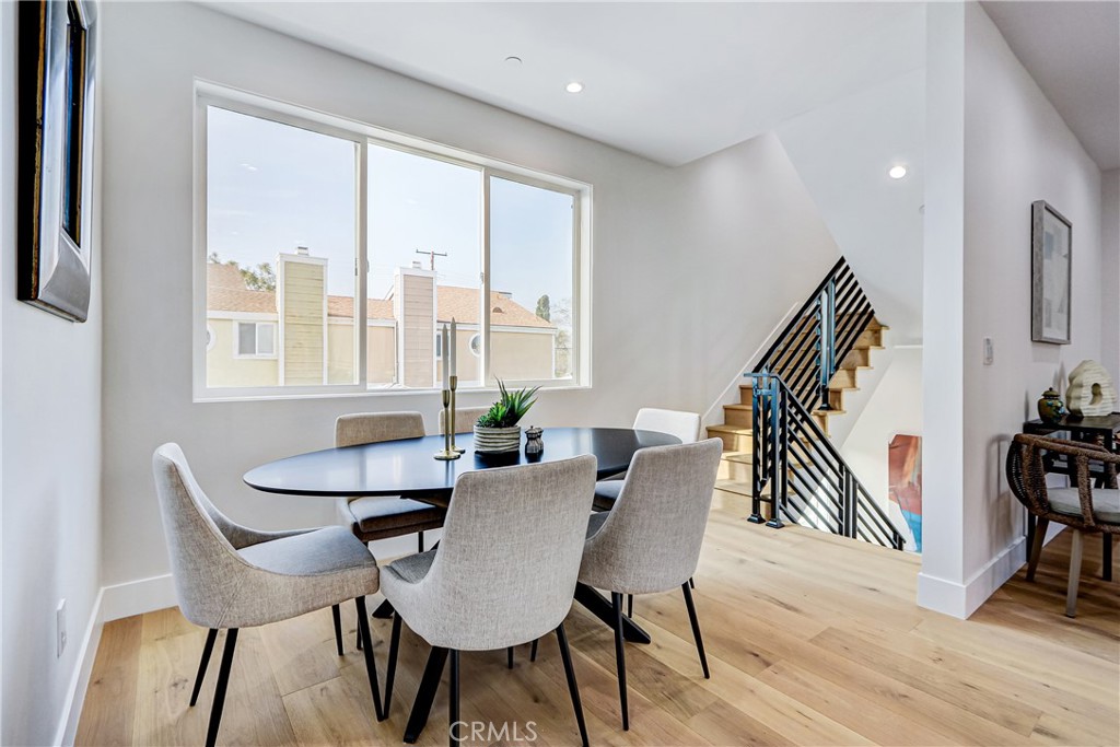 2405 Mathews Avenue, Unit B Redondo Beach, CA 90278 - Photo 8 of 46 a view of a dining room with furniture window and wooden floor