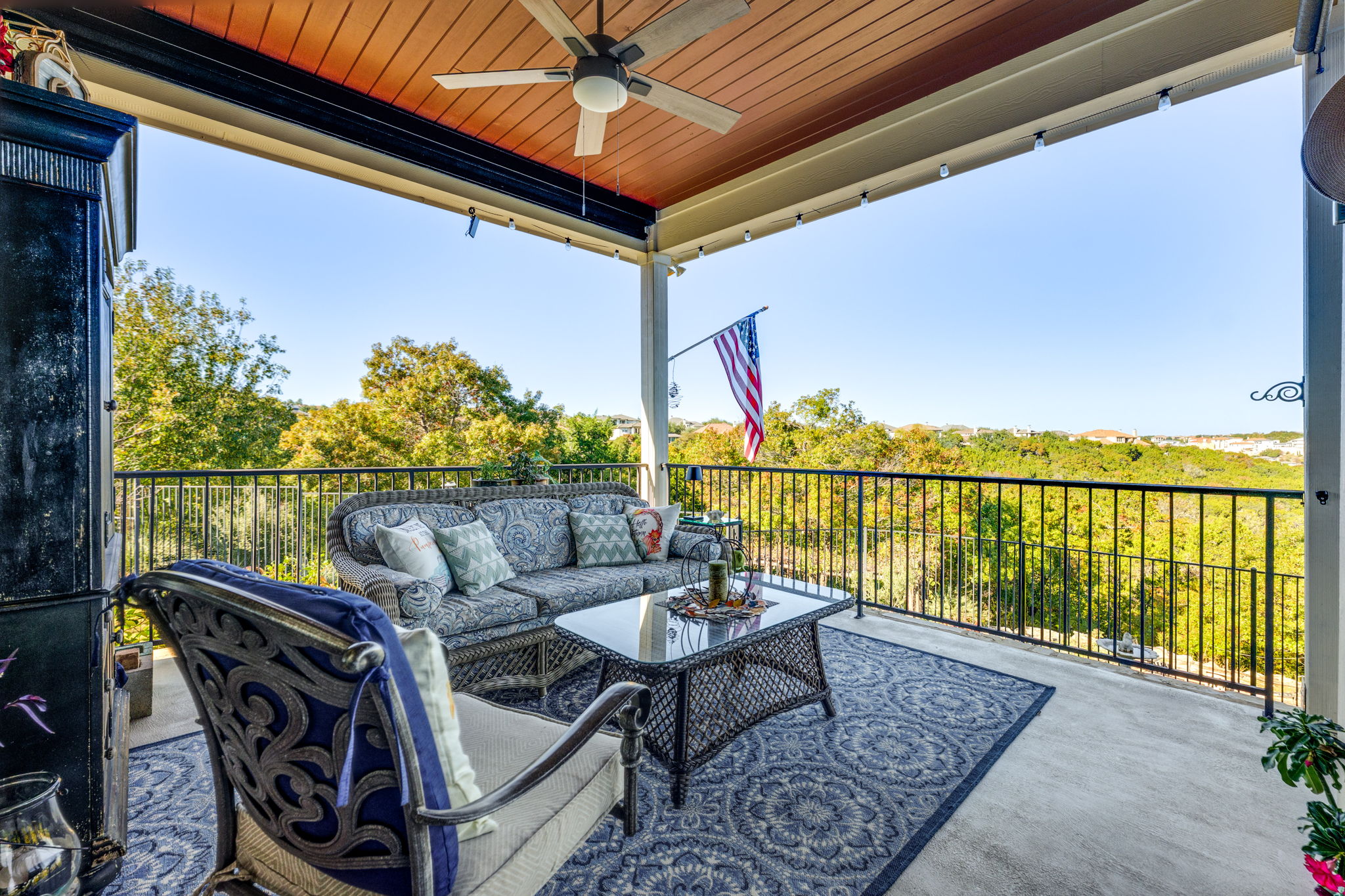 a view of balcony with furniture and outdoor seating