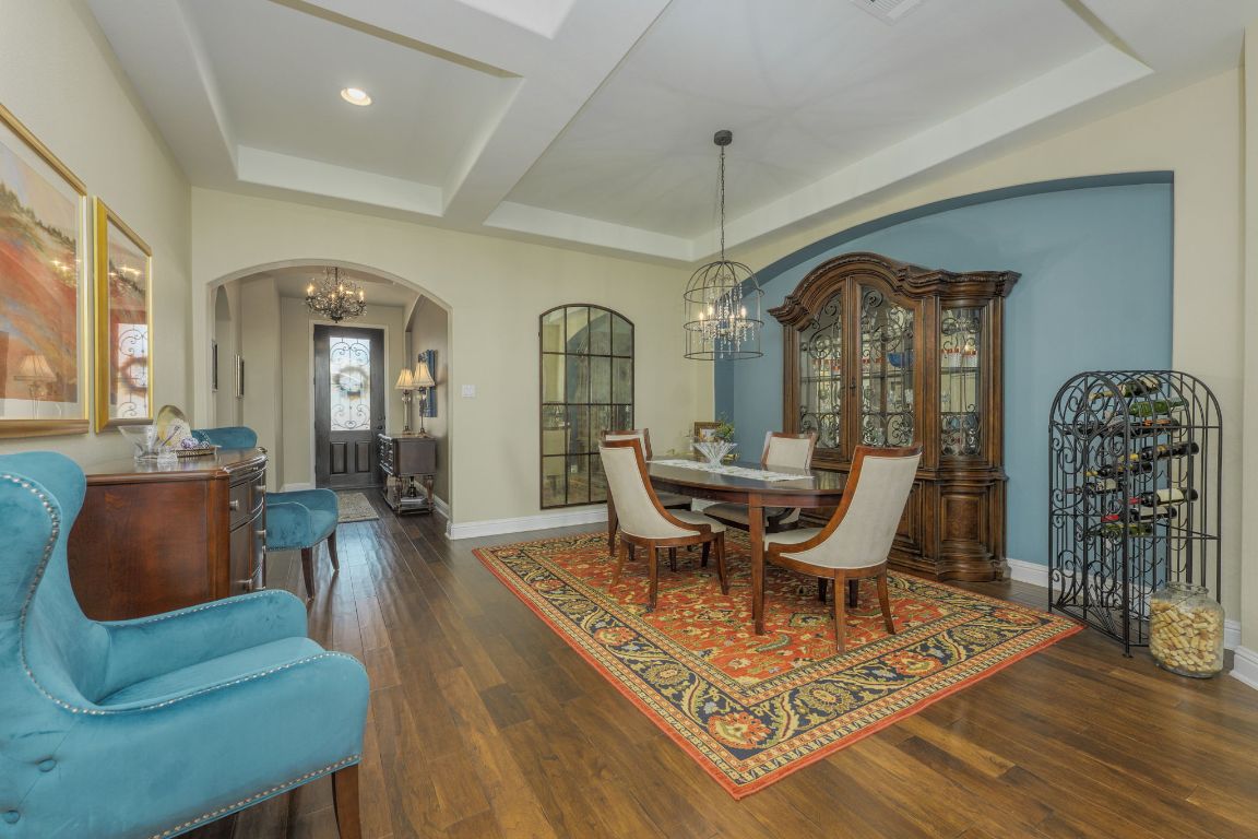 306 Tavish Trail Austin, TX 78738 - Photo 18 of 40 a living room with furniture rug and wooden floor