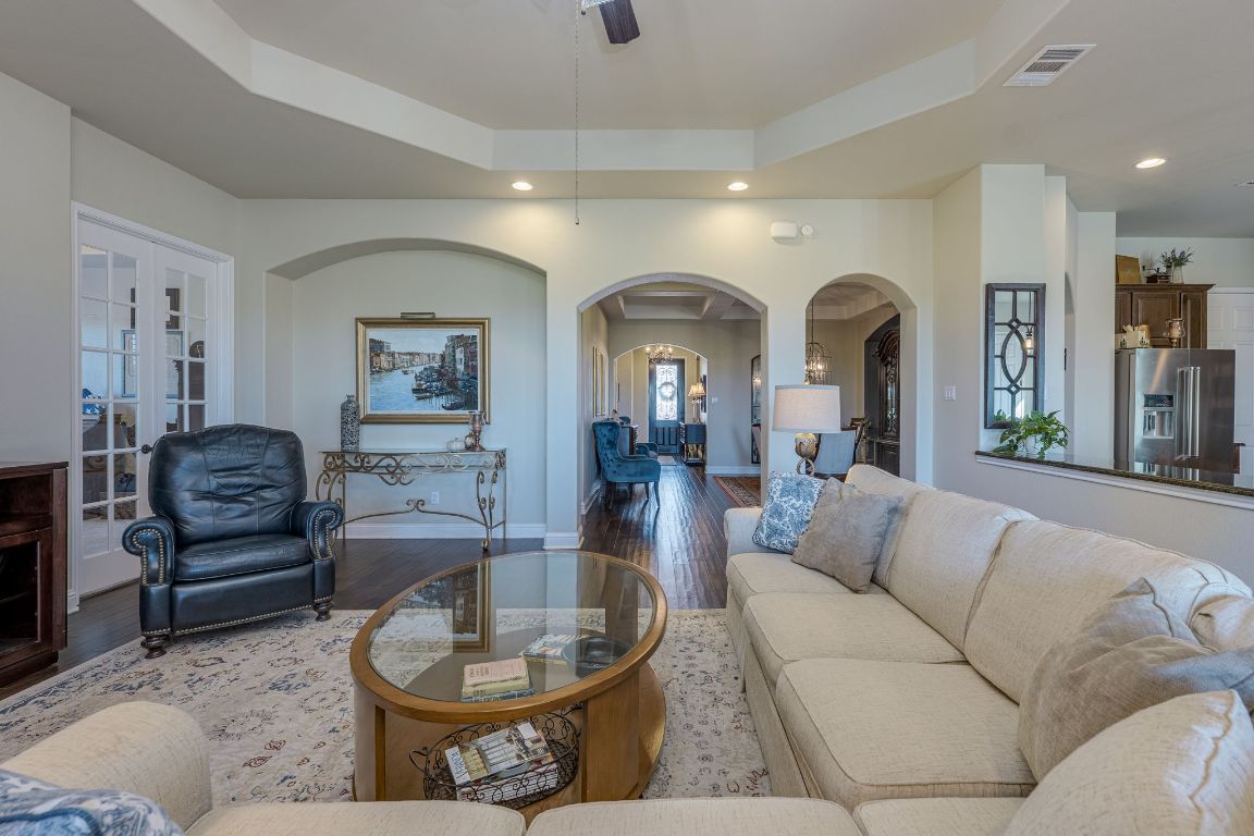 306 Tavish Trail Austin, TX 78738 - Photo 20 of 40 a living room with furniture and a wooden floor