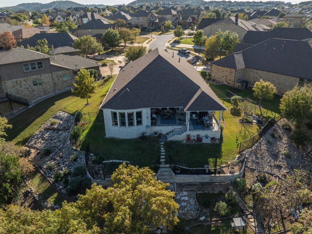 306 Tavish Trail Austin, TX 78738 - Photo 8 of 40 an aerial view of a house with a yard