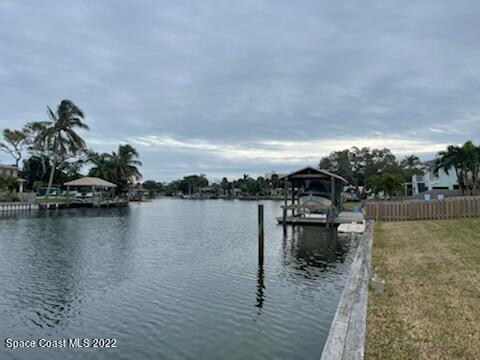 1011 Bali Road Cocoa Beach, FL 32931 - Photo 5 of 6 a view of a lake